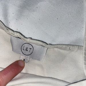 White thin strap top.